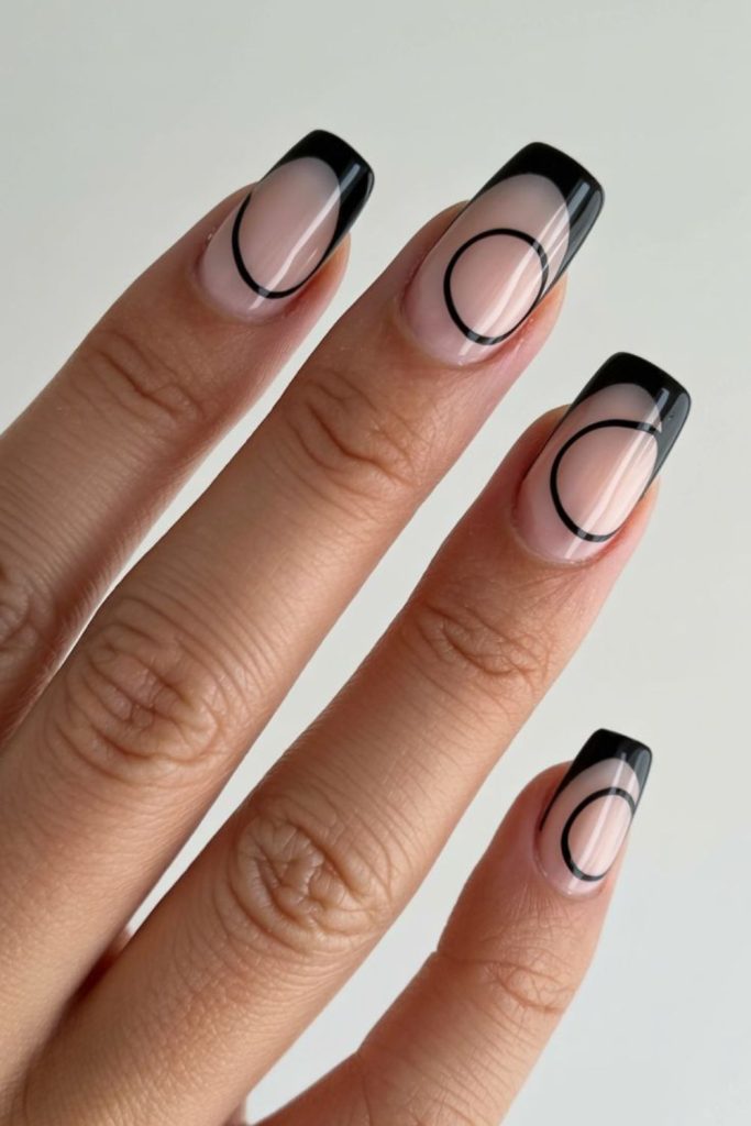 Soft arcs near tips black nails