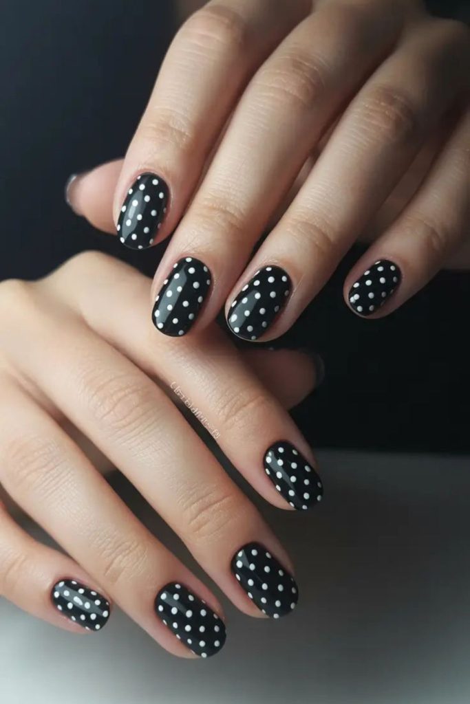 Tiny white dots on black nails