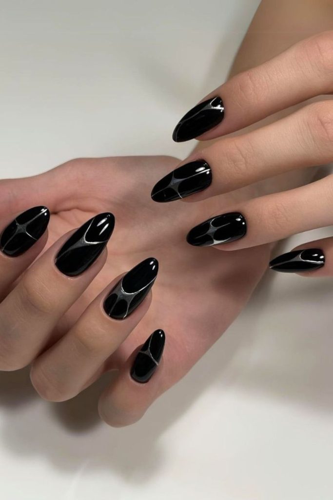 Subtle silver streak on black nails