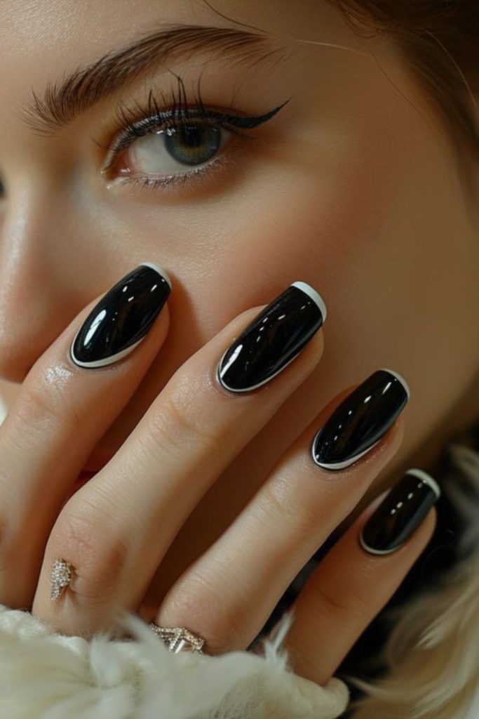 Curved lines hugging black nail edges
