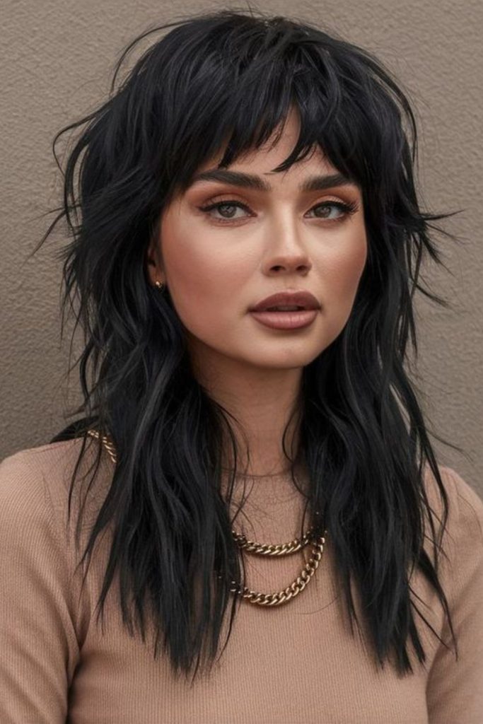 Dark layered wolf cut edgy.