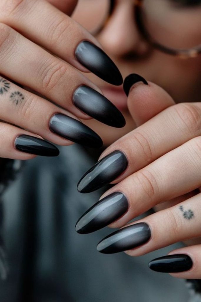 Dark smoky nails with subtle sparkle