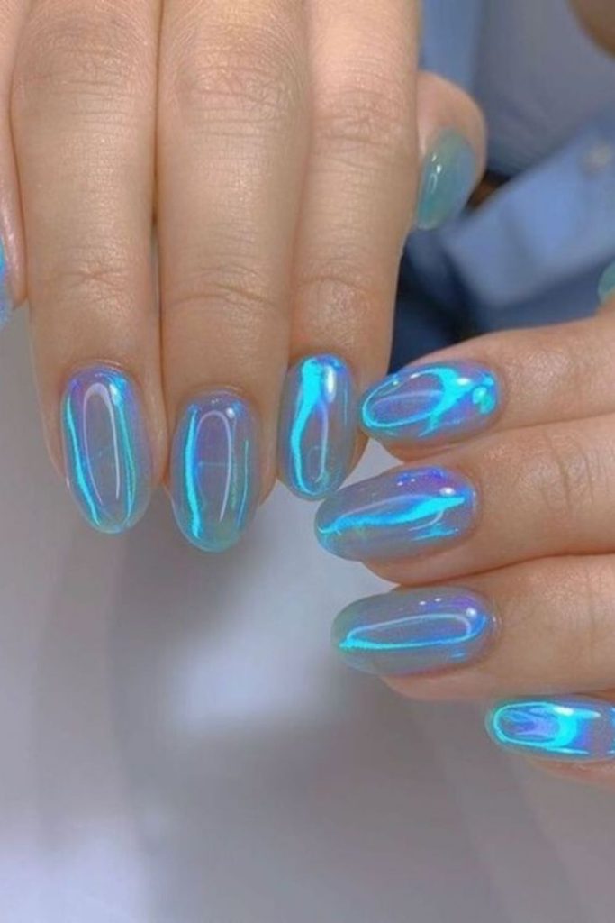 Aqua pearlescent nails with bubble effect