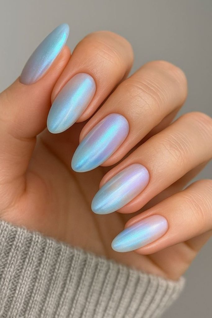 Aqua nails with pearly tide effect.