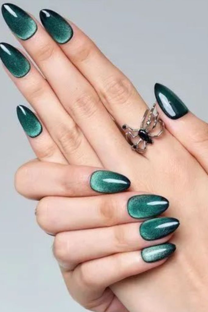 Dark green cat eye nails