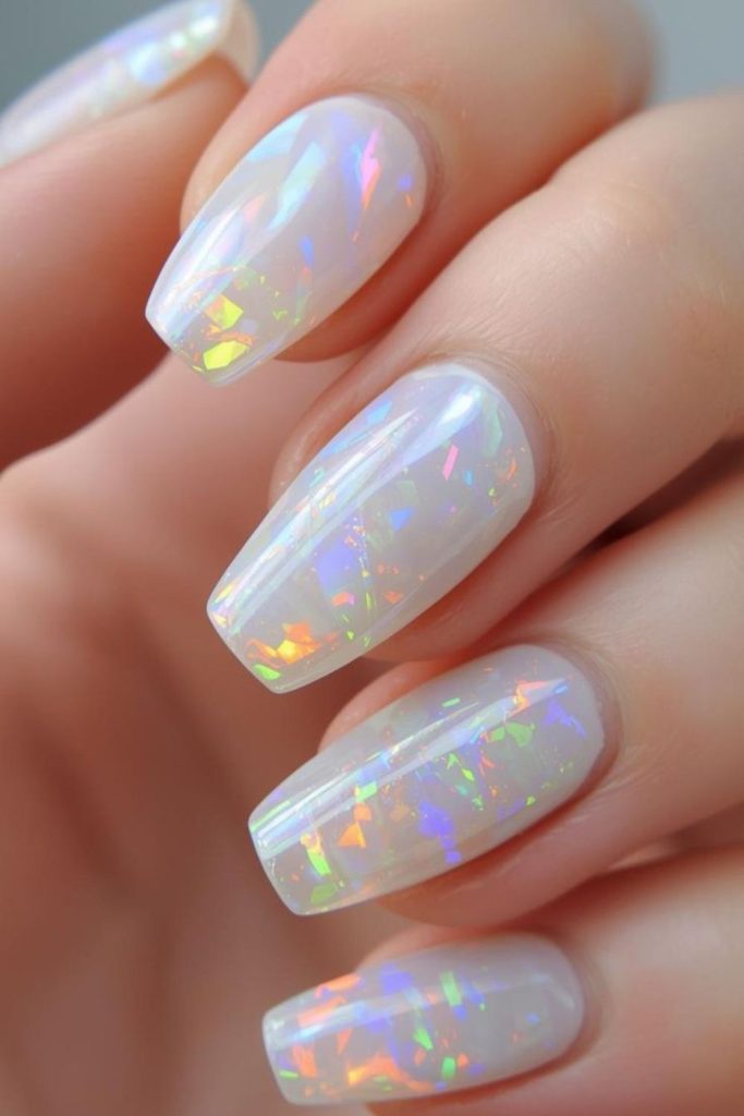 Iridescent opal nails with gentle allure.