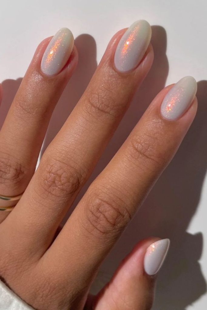 Milky nails with opalescent shimmer flashes