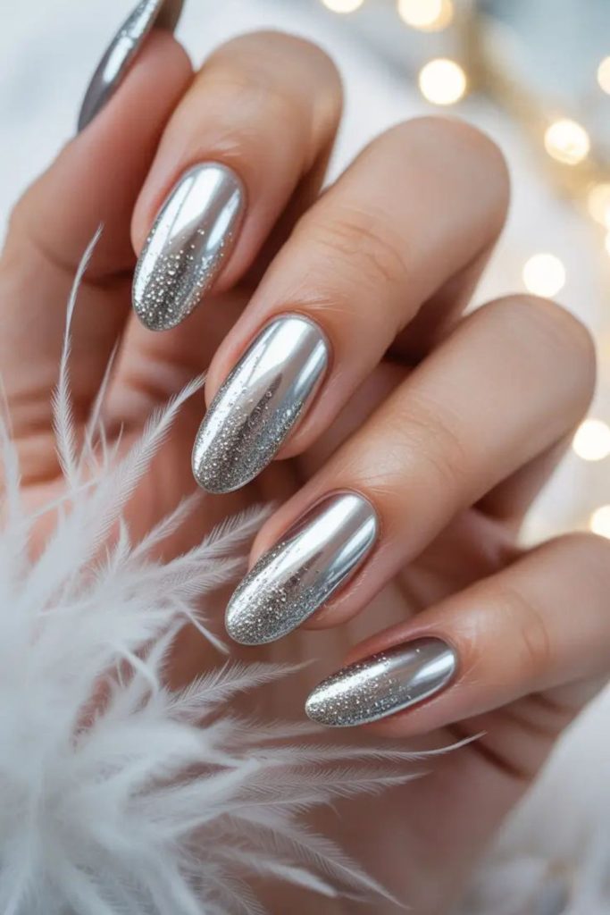 Taupe nails with chrome silver glitter bursts.
