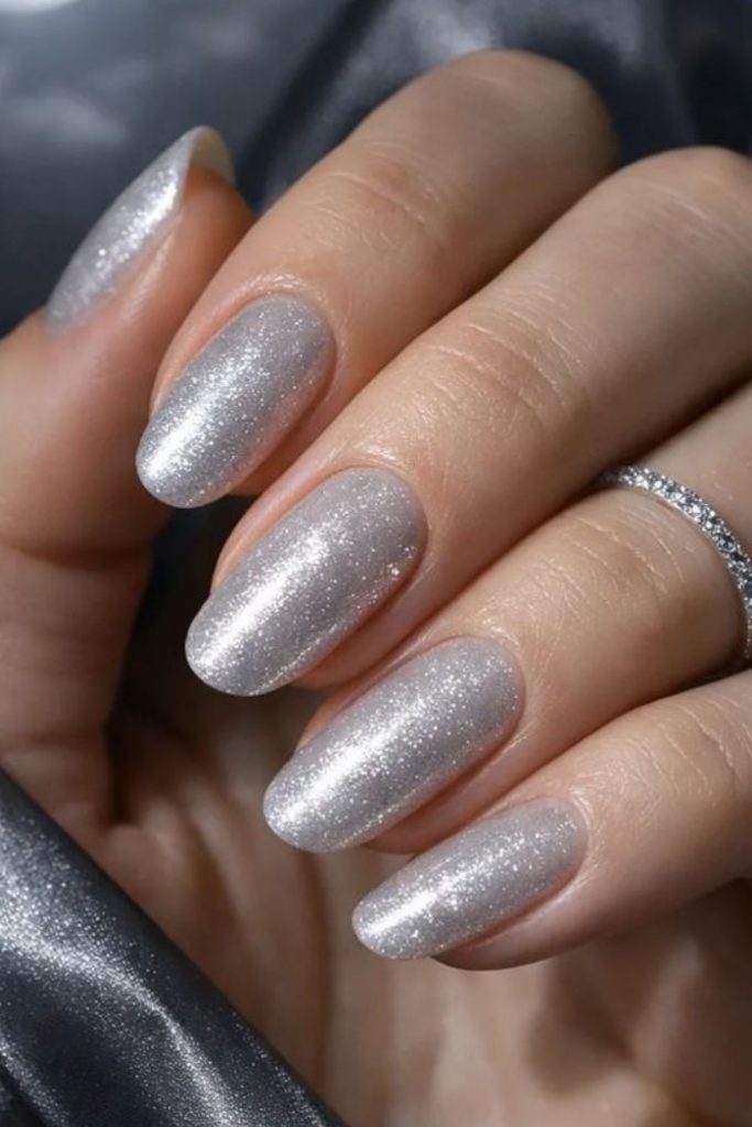 Metallic platinum shimmering nail design