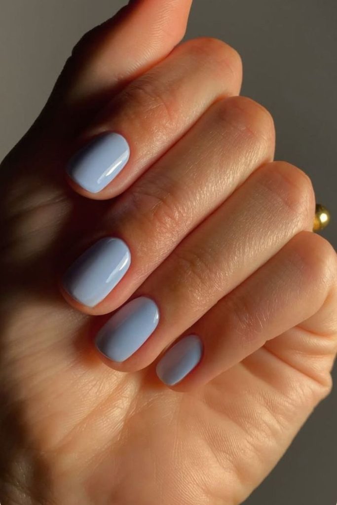 Powder blue calm nail design.