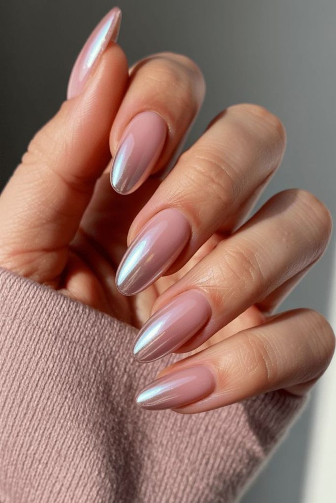 Blush pink nails with soft elegance.