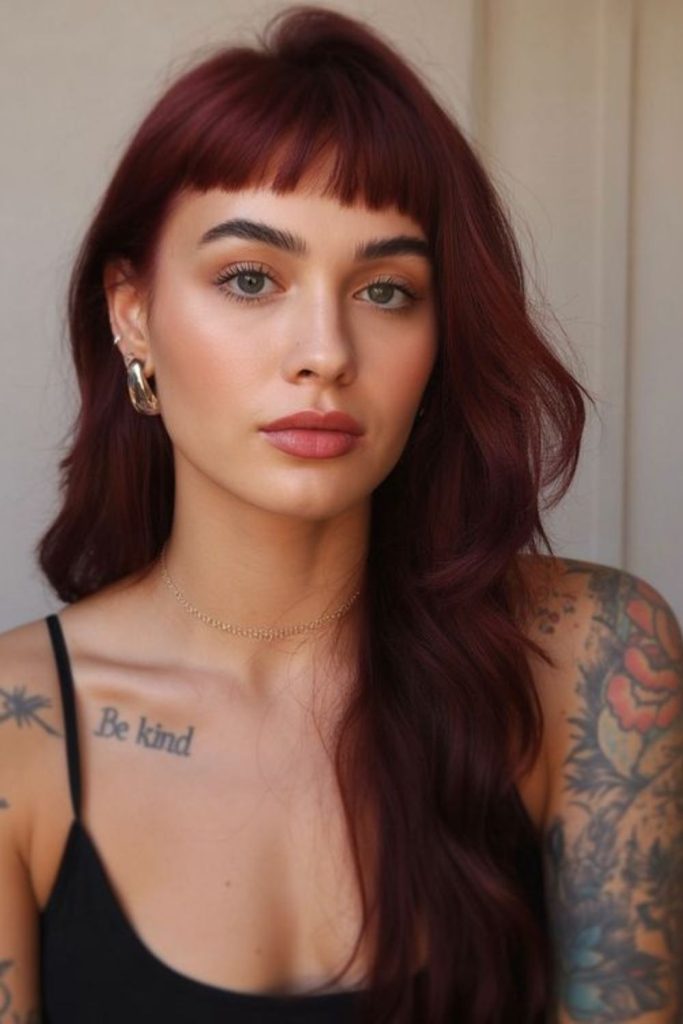 Rosewood-tinted micro bangs with flow