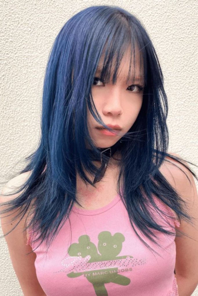 Blue textured layered wolf cut.