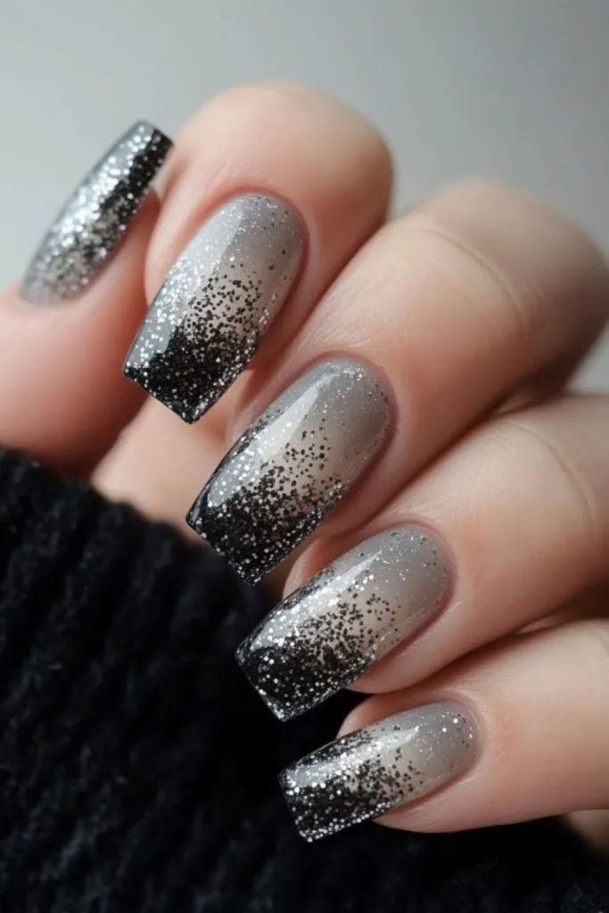 Transparent nails with falling silver glitter drips.