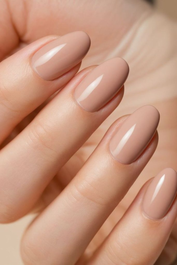 Skin tone matching nude nails.