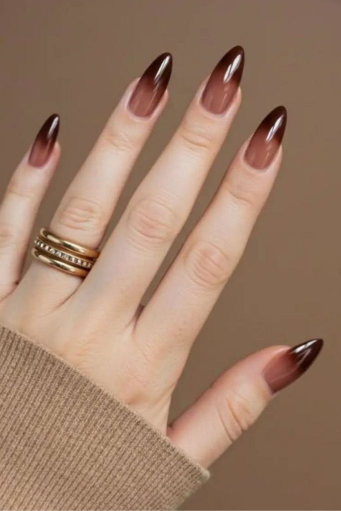 Soft smoky brown nails with translucent streaks
