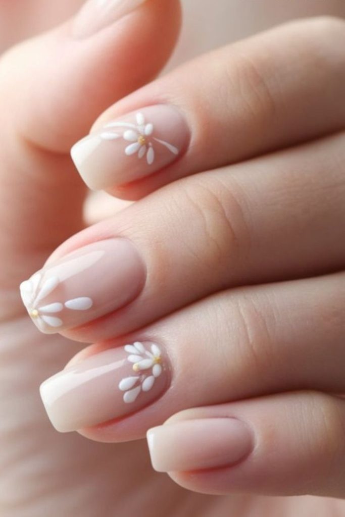 Milky nails with tiny floral accents