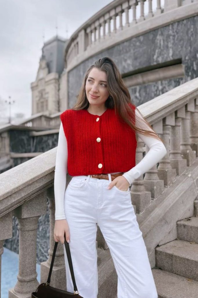 Knit vest with pleated trousers