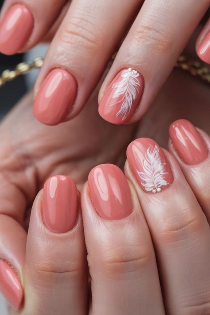 Coral nails with playful sophistication shine.