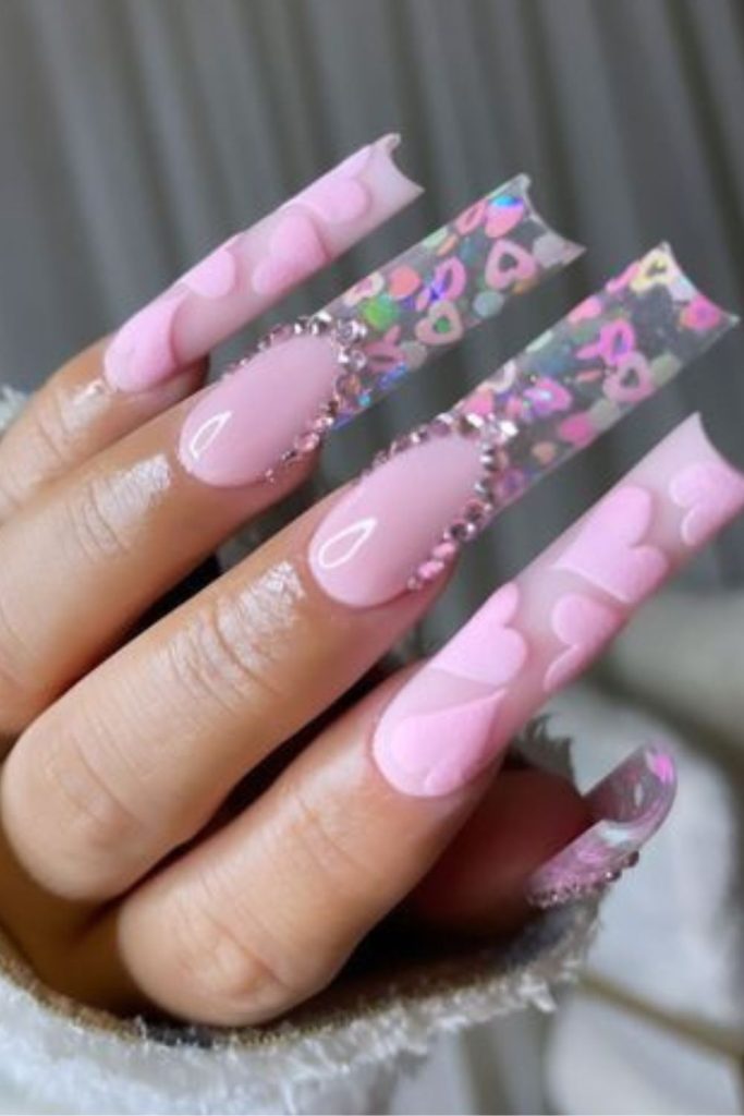 Playful sugar drip pink nail art.