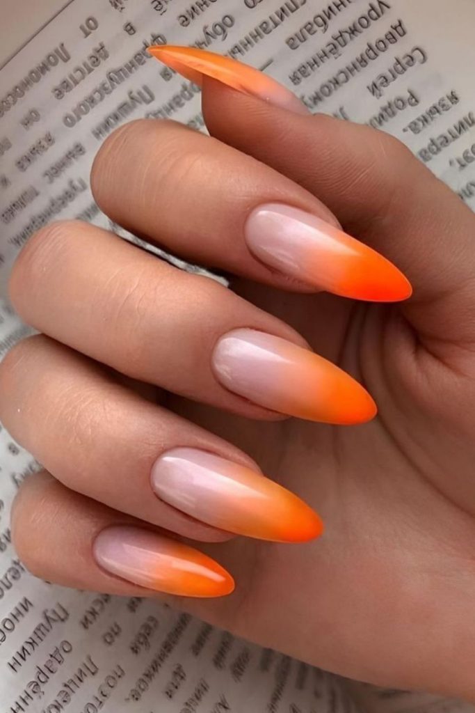 Fiery orange nails with fading gradients