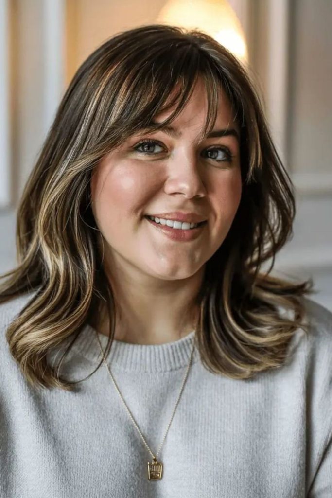 Tousled shoulder-length hair with flicked ends