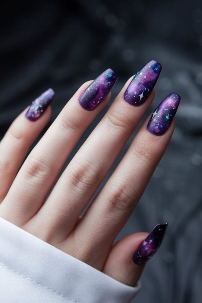 Pink purple galaxy with scattered stars