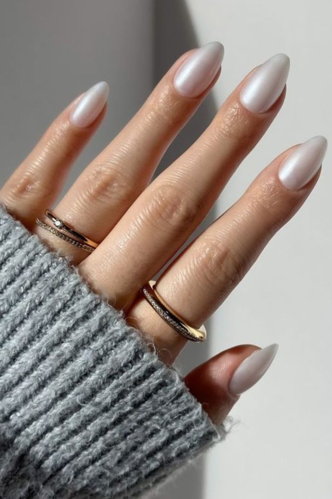 Soft white nails with satin shimmer