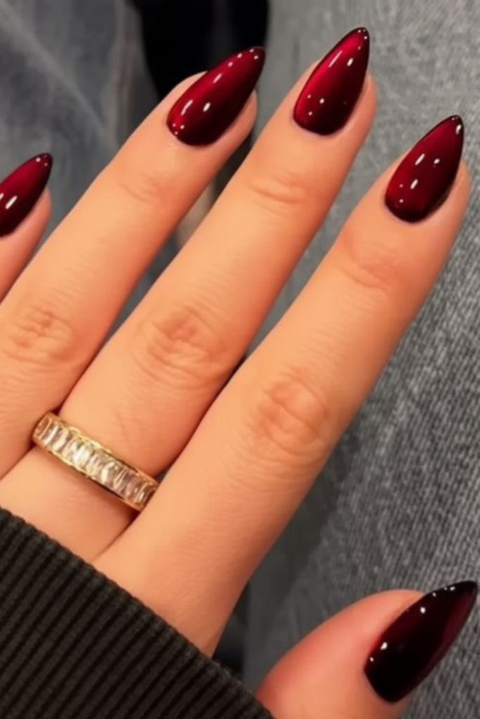 Deep crimson velvet Valentine heart nails.