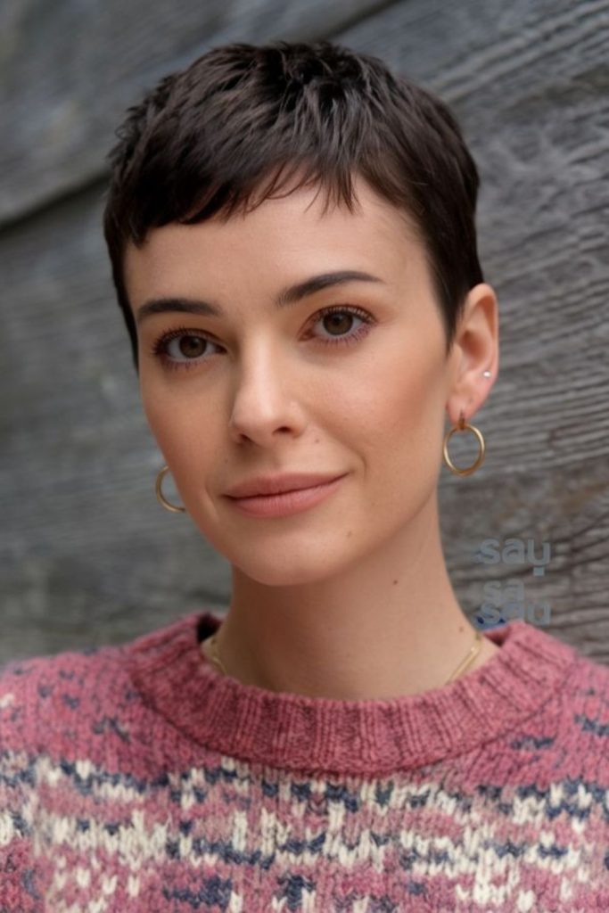 Wartime utility pixie haircut style.