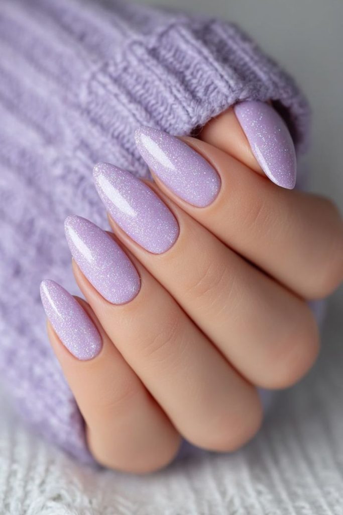 Pastel lilac nails with subtle shimmer.