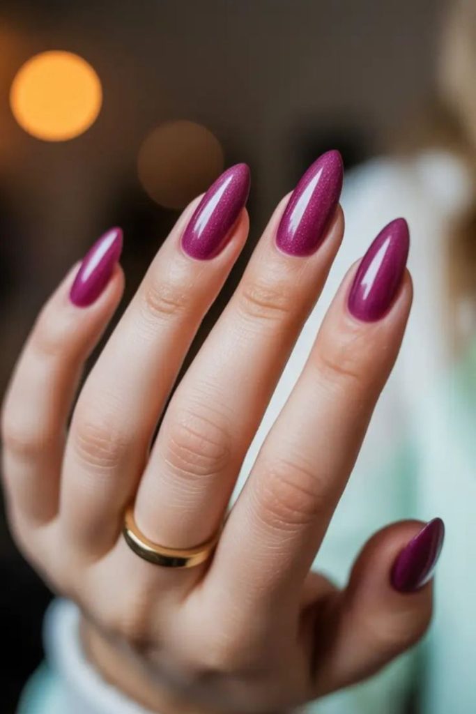 Deep berry nails with glossy finish