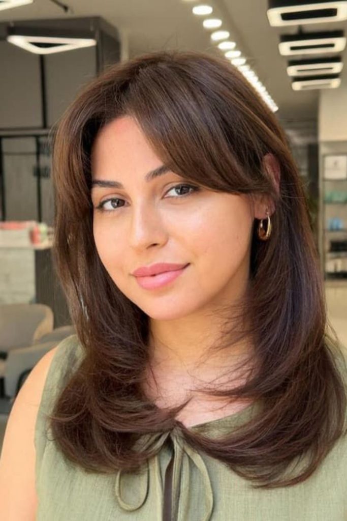 Wispy side crescent bangs floating freely