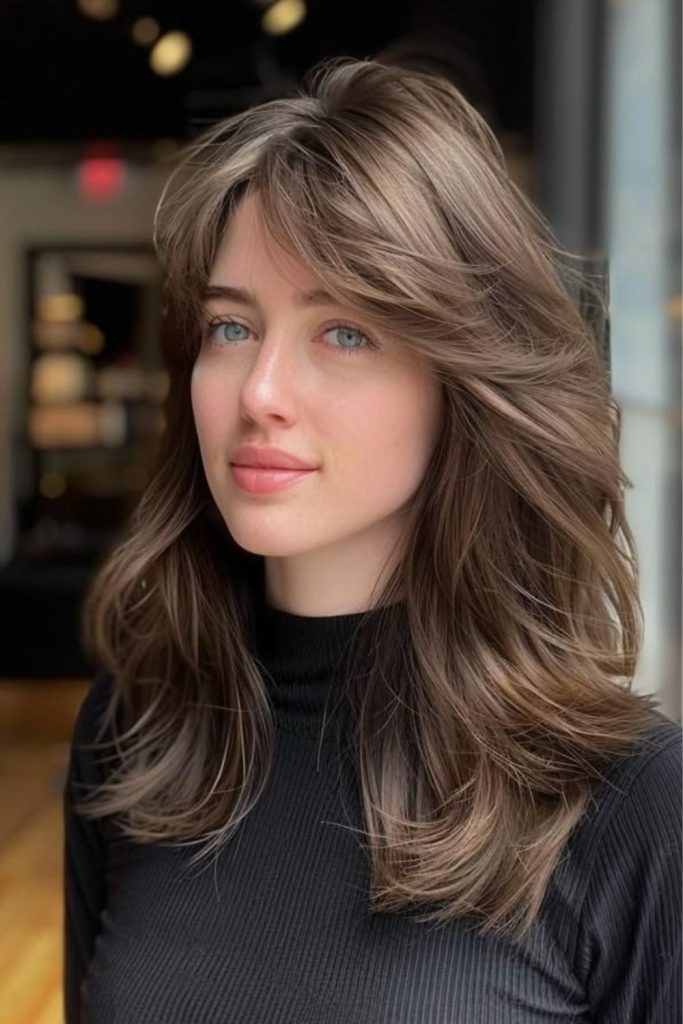 Asymmetrical side-swept bangs with movement