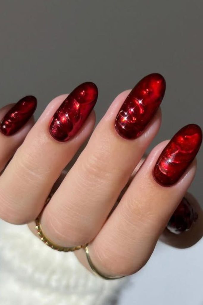 Deep red nails with lunar accents