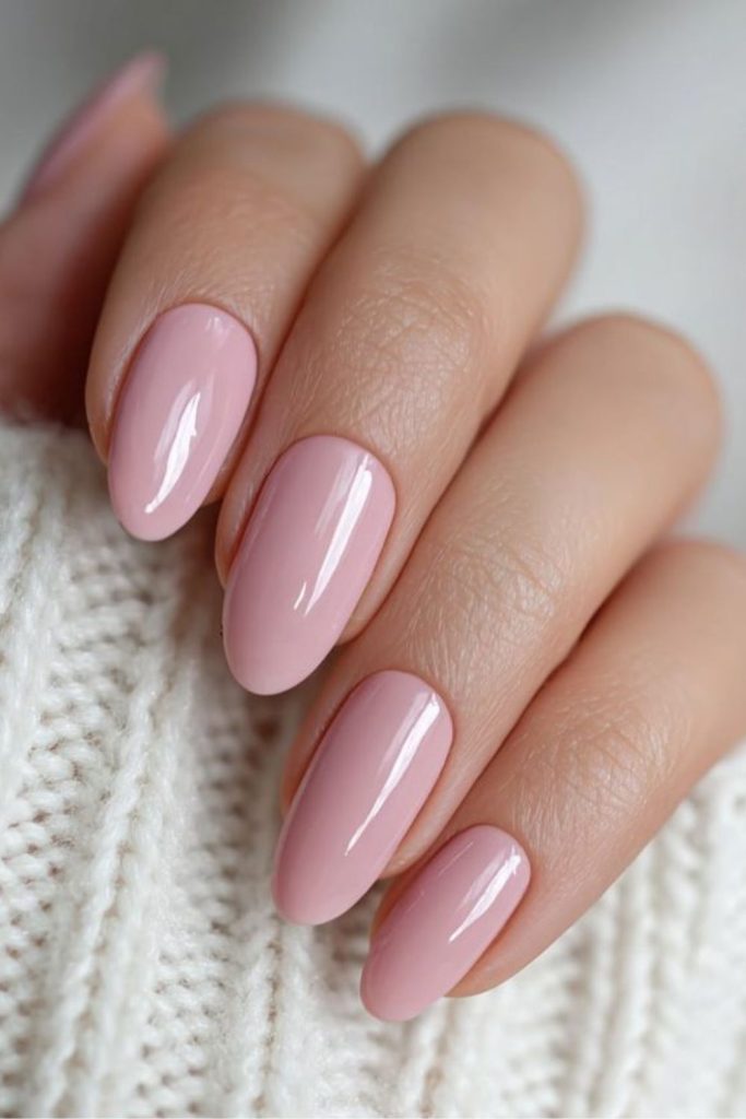 Soft pink nails, gentle feminine charm.