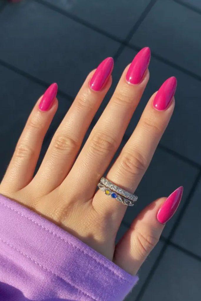 Bright pink playful nails.