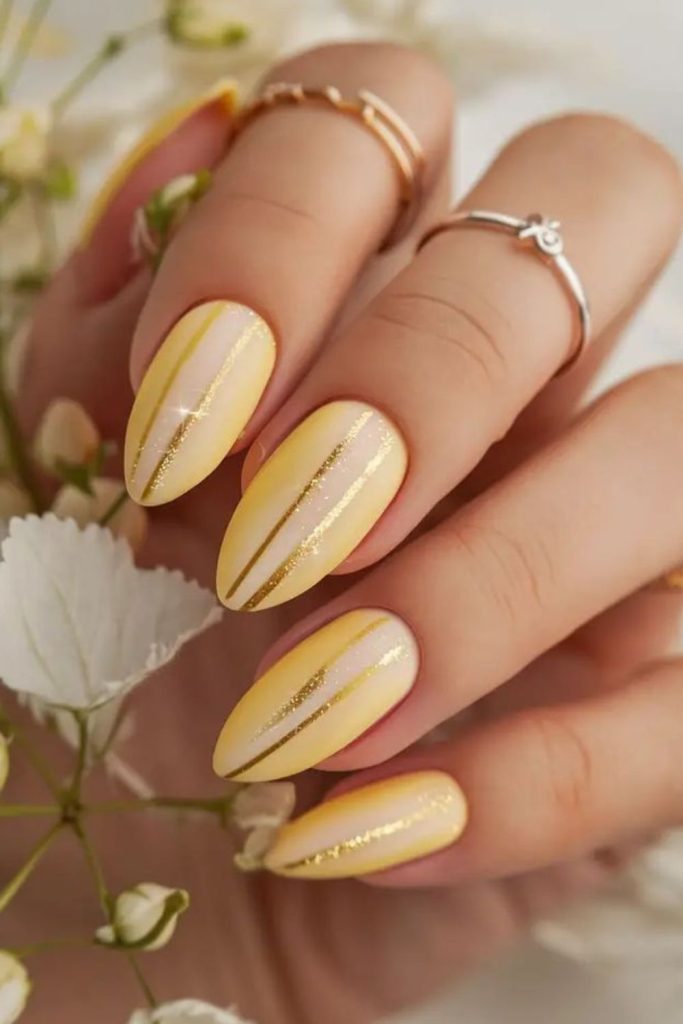 Yellow nails with reflective shimmer