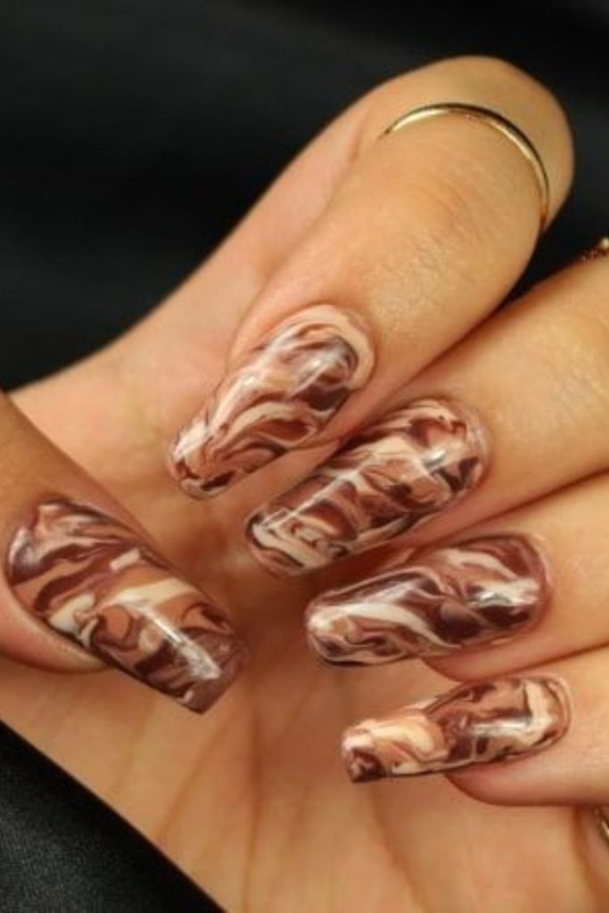Mocha and caramel swirled elegant nails