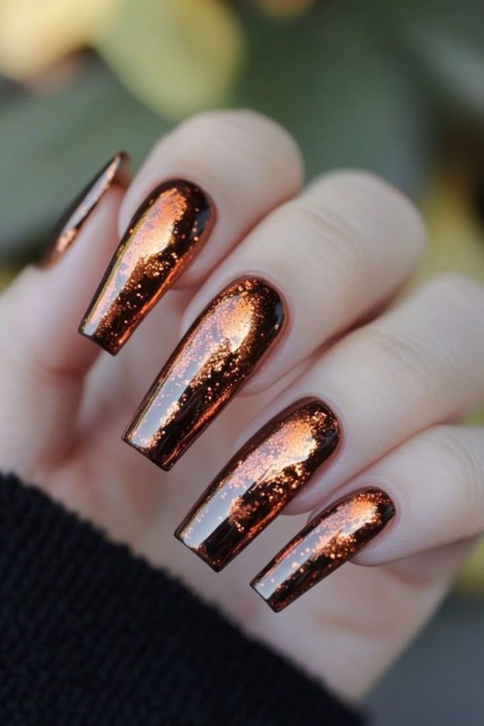 Espresso nails with gold leaf patterns