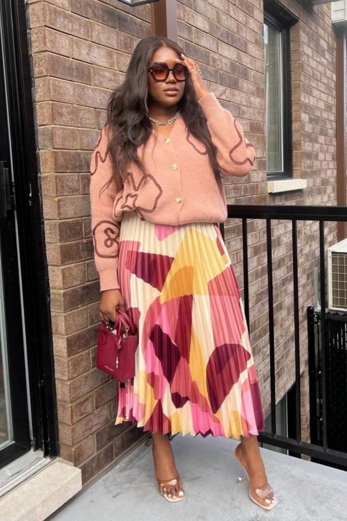 Coral cardigan jacket pleated skirt