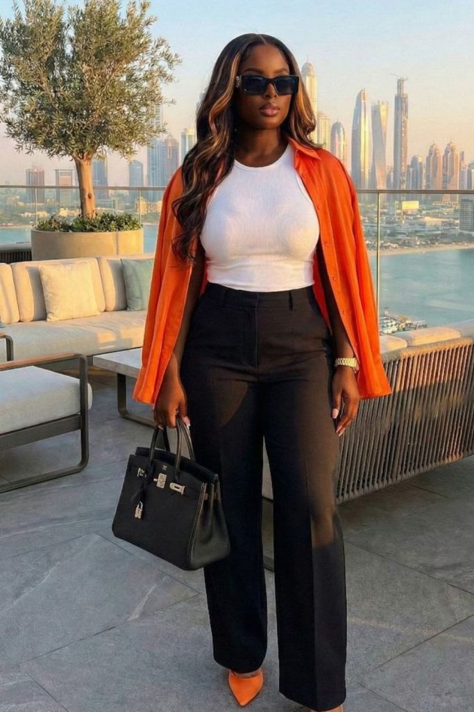 Coral cardigan paperbag trousers chic