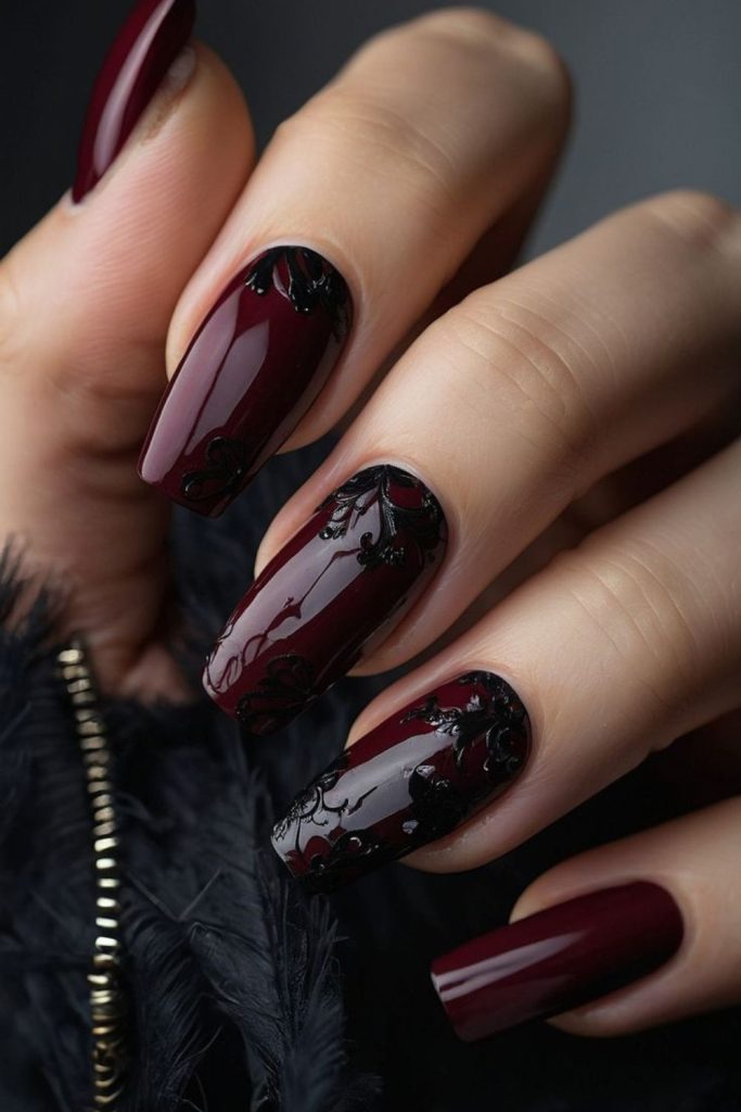Wine nails layered with intricate lace