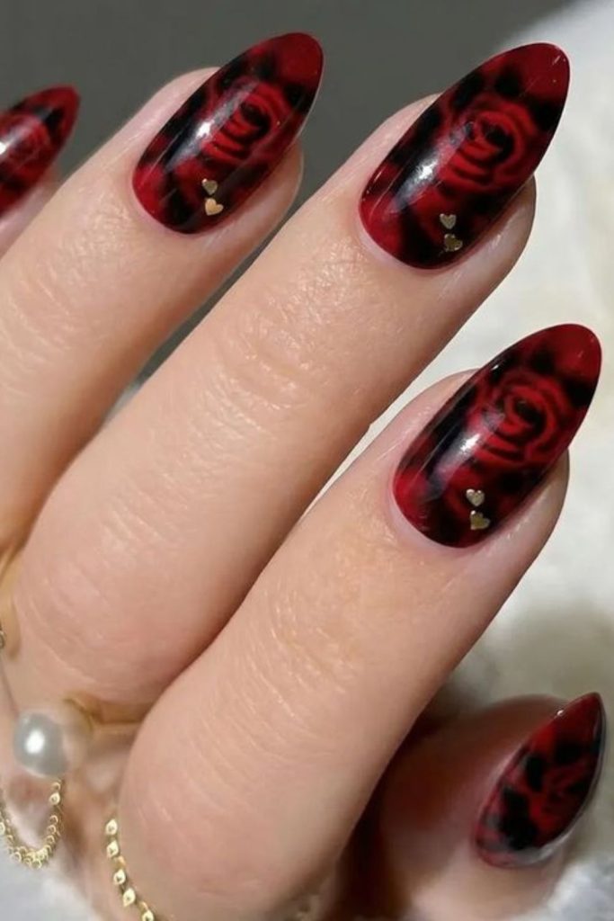 Black nails with blood-red petals