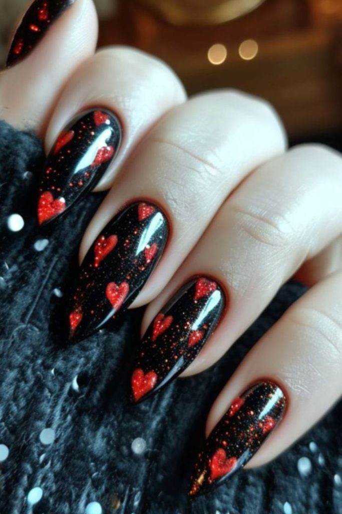 Black nails with jagged red shards
