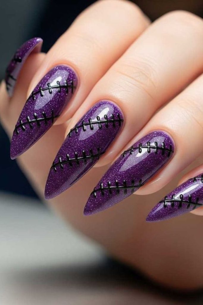 Purple nails engraved with mystical sigils