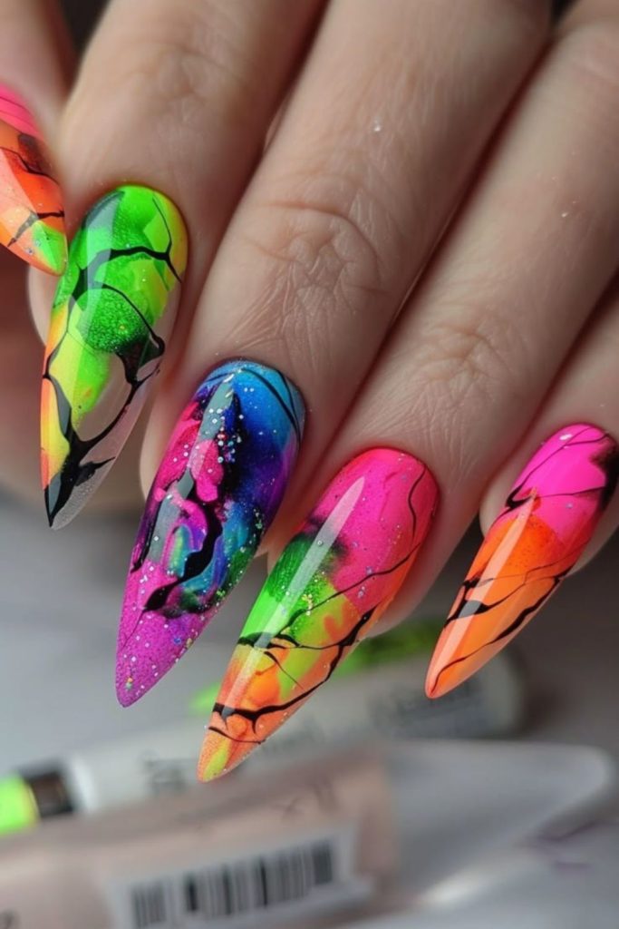 Psychedelic neon nails with fluid blobs.