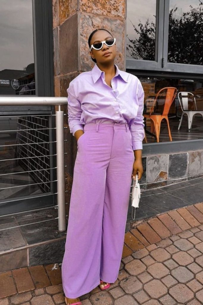 Lavender blouse pleated pants elegance