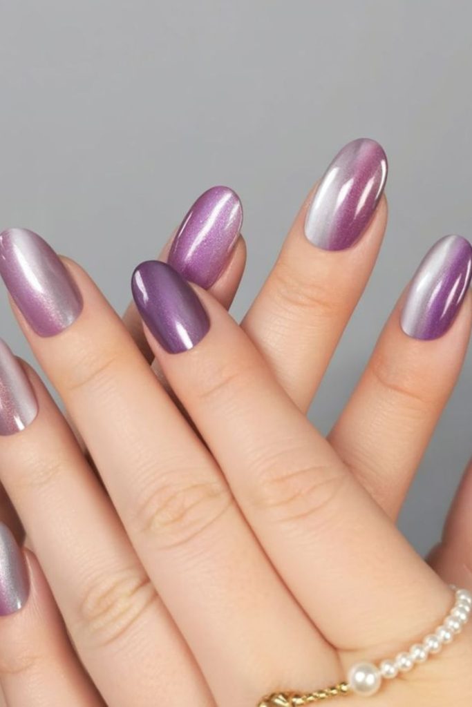 Soft lilac nails with silver accents