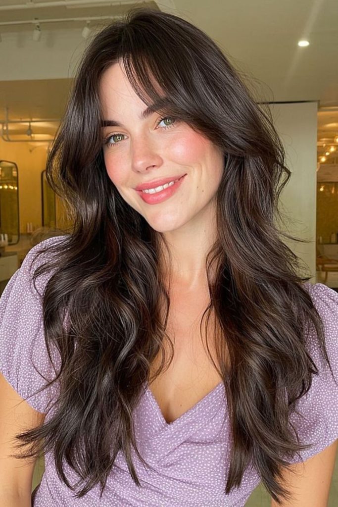 Layered curtain bangs sweeping sideways